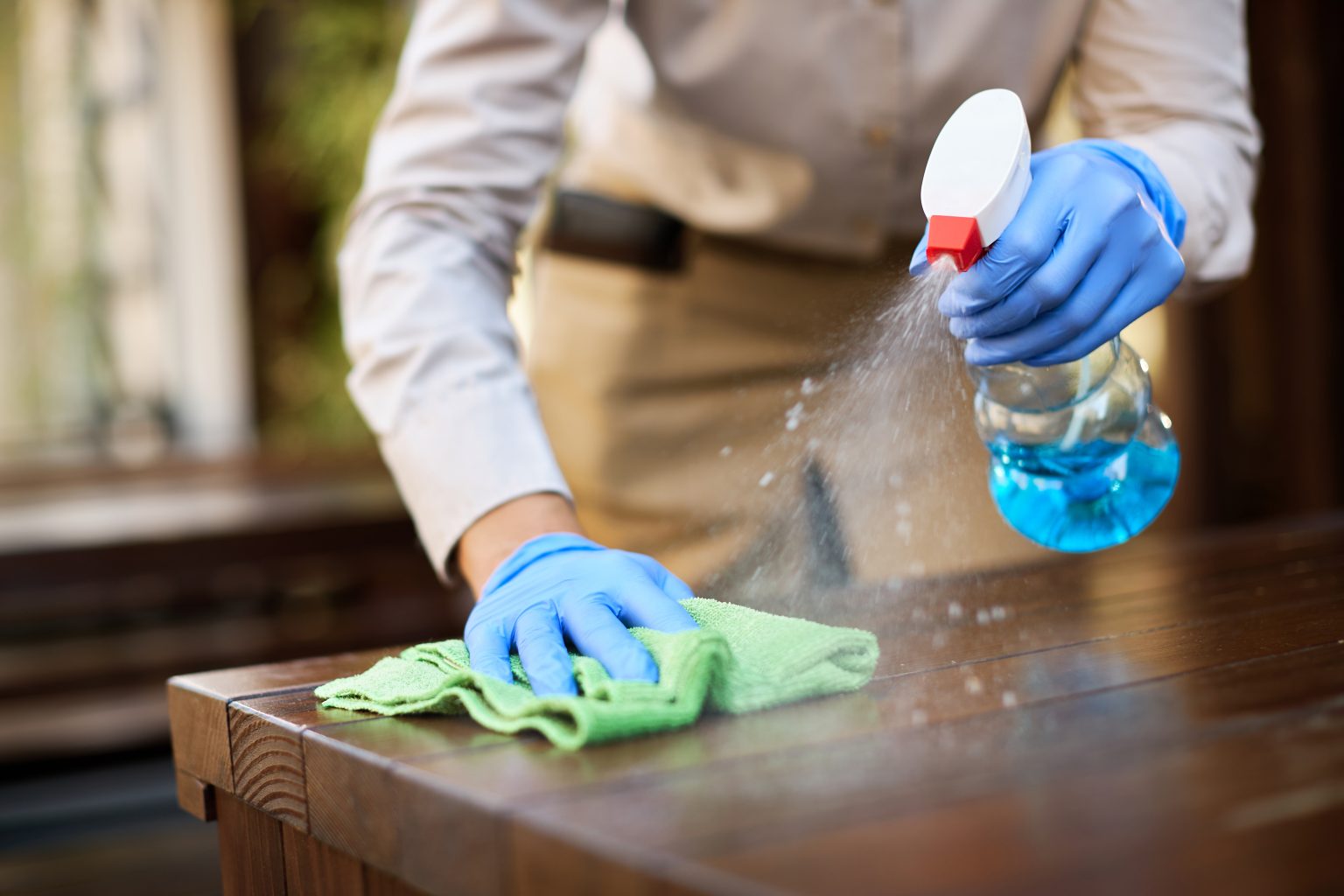 How To Clean Grease Off Your Kitchen Cabinets A Step By Step Guide   Closeup Waitress Disinfecting Tables Outdoor Cafe 1536x1024 